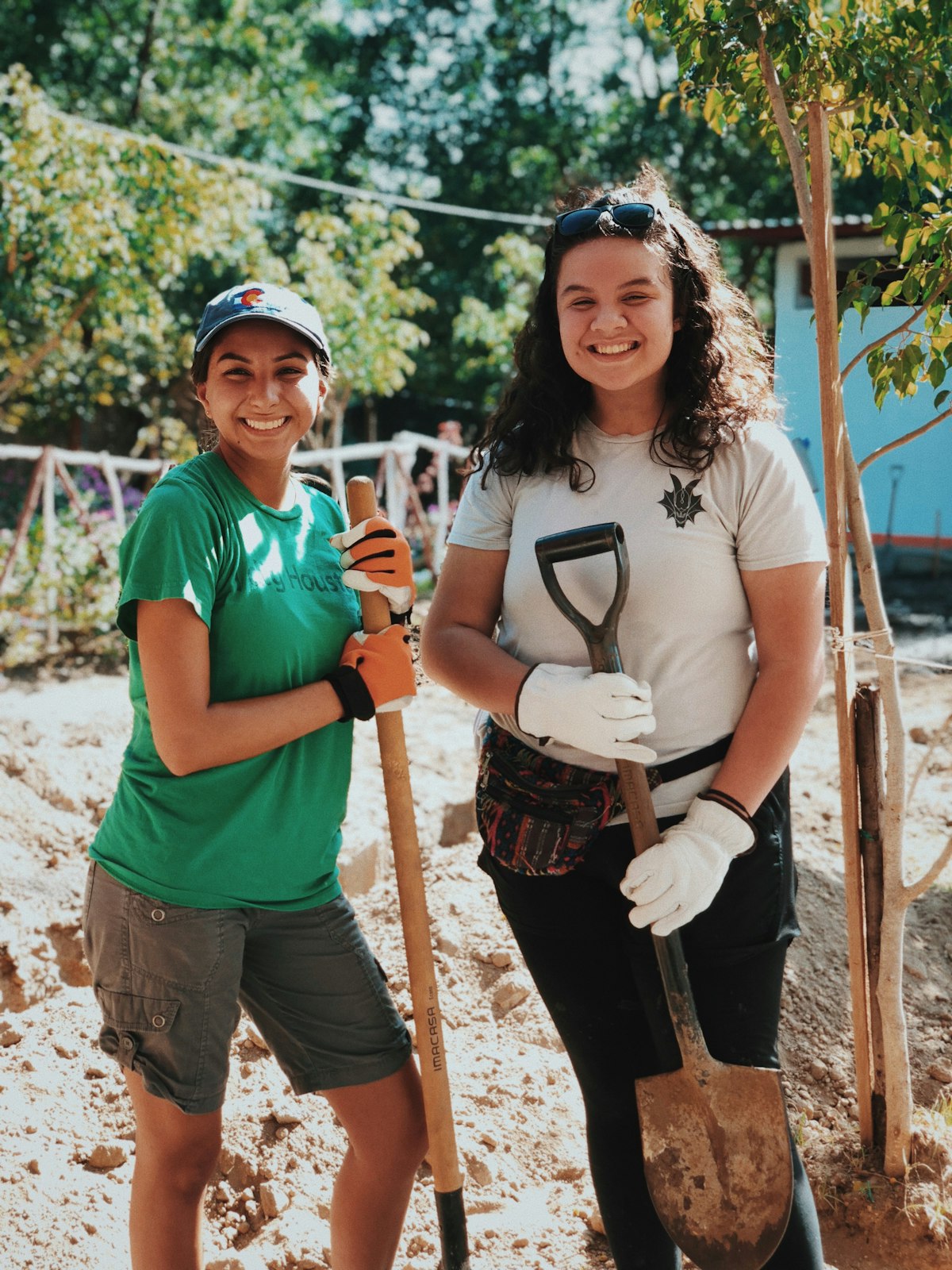 Community volunteers with gardening tools